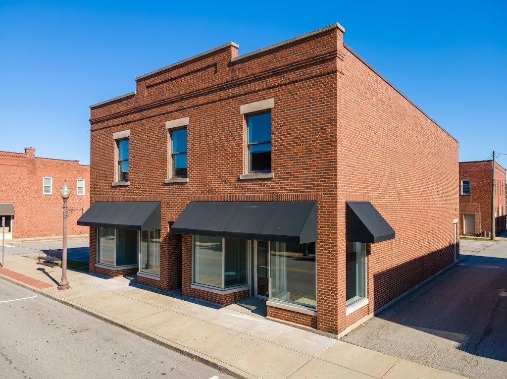 Two-story brick commercial building on a small-town main street